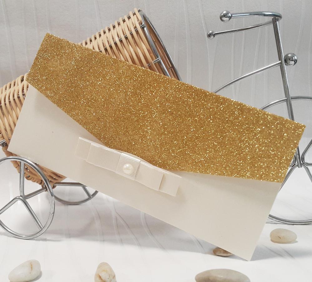 Elegant invitation with a gold textured pattern